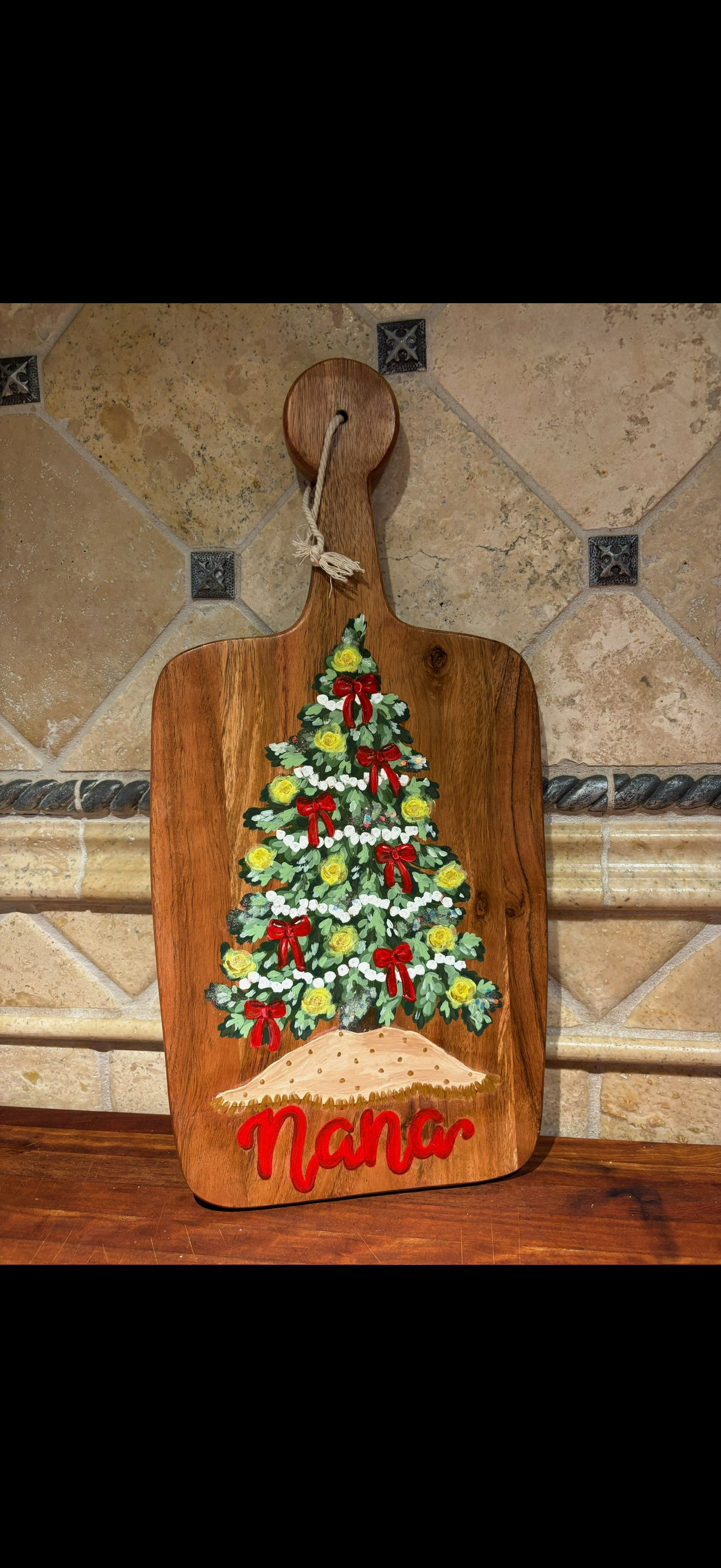 Custom hand-painted Christmas tree cutting board personalized for Nana